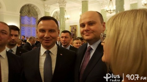 A. Kosztowniak obok prezydenta Polski